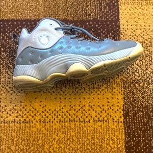 Gray and white team Jordan sneakers